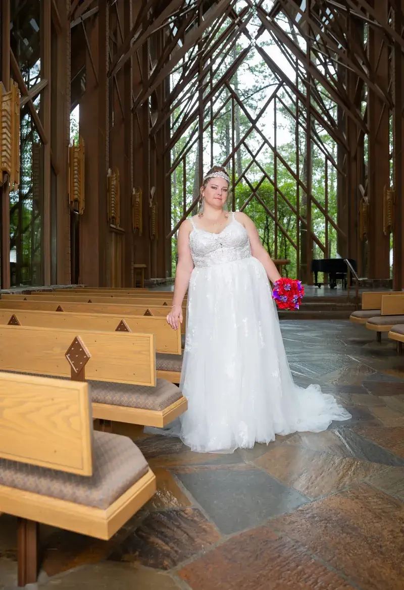 Full-length bridal portrait among the wooded gardens at Garvan Woodland Gardens, Hot Springs