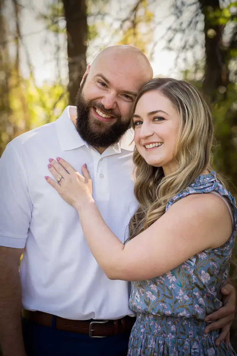 Close-up engagement portrait at Two Rivers Park with soft evening light